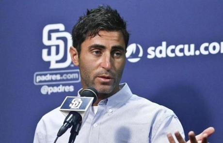San Diego Padres general manager A.J. Preller answers questions about the trading of all-star pitcher Drew Pomeranz to the Boston Red Sox prior to a baseball game against the San Francisco Giants Friday, July 15, 2016, in San Diego. (AP Photo/Lenny Ignelzi)

